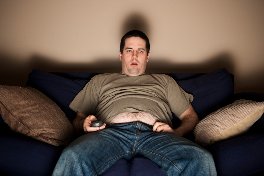 Overweight slob watching TV