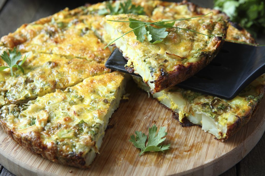 Italian Frittata with slices of fresh greens